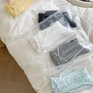 Detail view of ruffled bow mid-tube socks, showcasing multi-color options in clear bags.