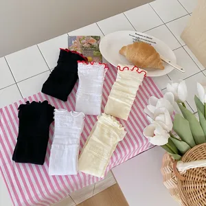 Detailed view of women summer breathable hollow lace ruffle stack socks, elastic cute ballet style.