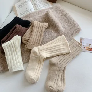 Cozy ribbed wool blend mid-tube slouchy socks in versatile retro winter colors for daily wear.