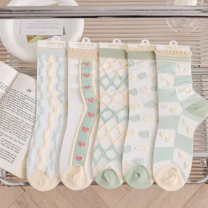 Sheer cute Japanese style grid heart thin crew socks for women, fashionable summer mesh hosiery.