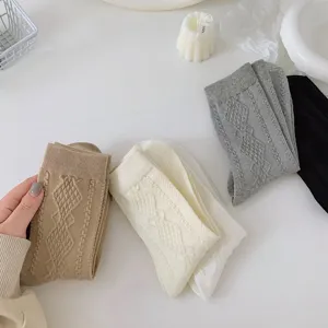 Women knit cotton mid-tube socks with elegant diamond pattern, soft and comfortable daily wear.