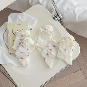 White cute mid-calf socks with strawberry and daisy patterns, sweet Japanese style.