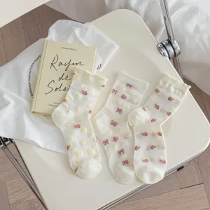 White mid-tube socks for women, cute Japanese style sweet strawberry and bow pattern sheer socks.