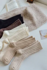 Ribbed knit wool blend mid-tube socks detail, cozy winter women solid color slouchy socks.