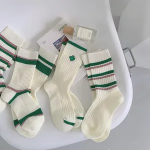 Green striped mid-calf socks for women, cute Japanese style casual cotton socks for daily wear.