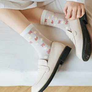 Cute Japanese style white mid-calf sheer socks with sweet floral bow and strawberry patterns for women.