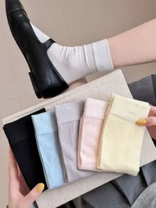 Detail view of ultra thin summer split toe socks in assorted pastel colors, soft fabric.