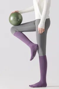 Professional five-toe yoga socks with anti-slip grip, long knee-high pilates compression socks.