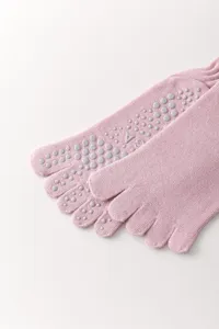 Calzini da yoga rosa a cinque dita con punti in silicone antiscivolo per fitness e pilates.