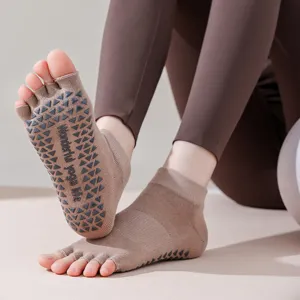 Open toe five toe yoga socks with silicone anti slip grips for women pilates fitness workout