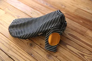 Classic black and white striped pet dog sweatshirt with cute brown elbow patch detail.