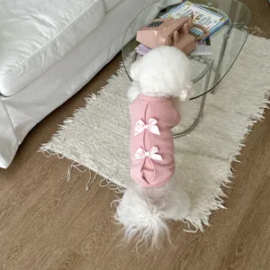 Cute pink pet dog sweatshirt with sweet bow knots, warm winter apparel for small dogs.