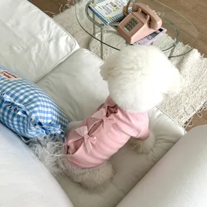 Cozy pink pet sweatshirt with sweet double bows detail, designed for small dogs and cats comfort.