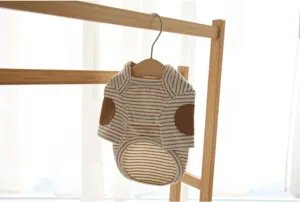 Stripe pet clothes detail shot showing soft knit fabric with cute elbow patches.