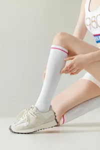 White knee-high women socks with pink stripe, stylish sporty long tube casual legwear.