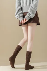 Detail view of brown slouch socks for women, thick knit Japanese JK style high socks.