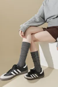 Grey slouch socks for women, thick knit ribbed knee high casual socks for autumn winter outfit.