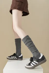 Grey ribbed long socks for women, cozy knit knee high socks, stylish casual leg warmers.