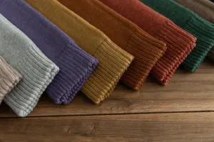 Detailed view of thick loop-knit women's long calf socks in various colors for winter warmth.
