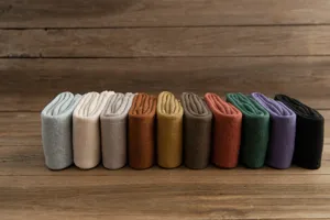 Close-up display of thick thermal solid color winter long socks in multiple rich color options.