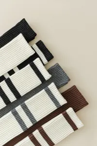 Cozy ribbed knit knee high socks featuring classic striped design, perfect for daily wear.