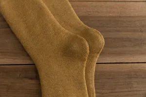 Thick knit winter warm crew socks for women, retro mustard yellow thermal terry socks detail.