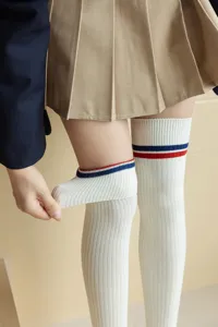 Knit over knee socks with double stripes, classic Japanese school style leg warmers for women.