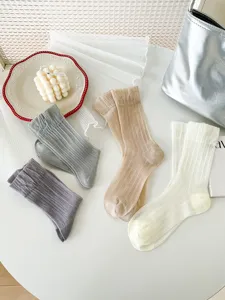 Sheer thin summer women long socks detail view, soft breathable solid color slouch socks white.