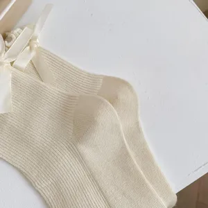 Chaussettes mi-mollet japonaises mignonnes avec nœuds en satin, style Lolita doux et tendance.