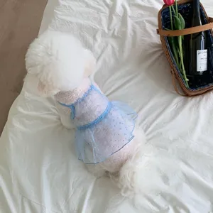 Detailed view of cute blue mesh strap pet dress for dogs and cats spring summer fashion pet wear.