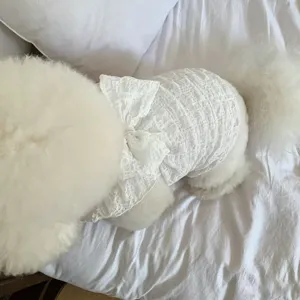 Adorable summer pet dress with cute bowknot and breathable lace fabric for small dogs and cats.