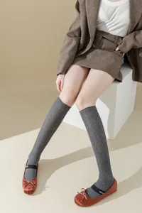 Grey ribbed knee-high knit socks detail, ballet style cute cozy long socks for daily wear.