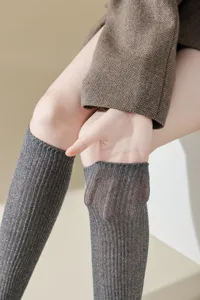 Glitter knit knee high socks for women, metallic ribbed long slouch socks for daily wear.