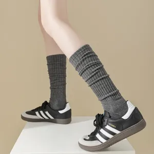 Grey ribbed long socks for women, knee-high slouch knit stockings for autumn and winter daily wear.