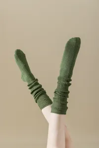 Green metallic knit slouch socks, ballet core style long knee high stockings for women.