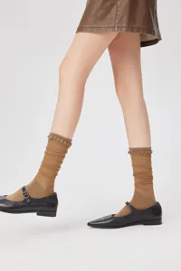 Women's ultra-thin sheer mesh mid-calf socks with delicate ruffled cuffs for summer daily wear.