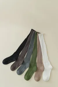 Ribbed knit glitter knee high socks in assorted colors, perfect for cute ballet core styles.