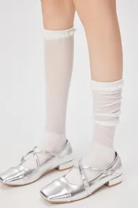 White mesh knee high socks lace detail lifestyle close up shot, lightweight summer hosiery