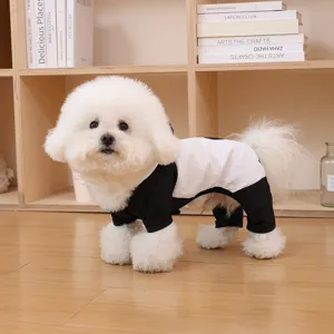 Close-up of black and white small dog raincoat jumpsuit, cute pet apparel for daily wear.