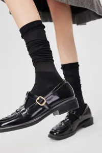 Black sheer mesh calf socks for women, ultra-thin knee-high stockings for stylish daily wear.