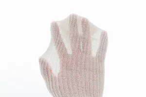Detail view of knitted slouch socks fabric showing elastic mesh texture and metallic yarn.