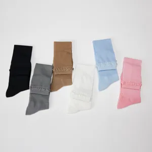 Ultra-thin mesh knee high socks for women, fashionable summer long socks with cute ruffle details.