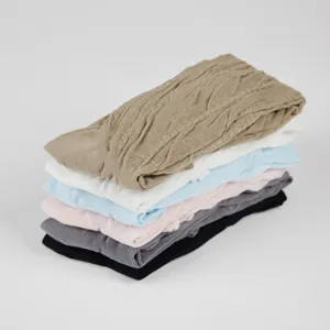 Detailed view of women knit long socks, cute solid color stack socks for sweet daily style.