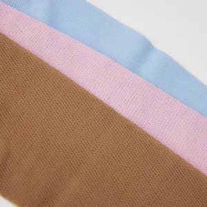 Close-up detail shot of ultra-thin mesh fabric in blue, pink, and brown for stylish socks.