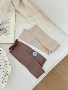 Women summer thin mulberry silk footless socks detail view, elegant solid color mid tube design.