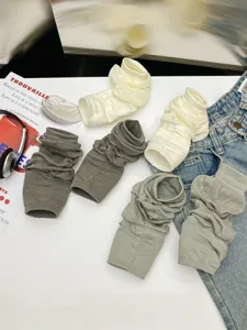 Thin knit stirrup leg warmers for women, breathable summer solid color calf socks.
