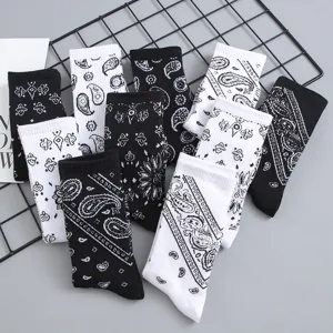 Men's black and white paisley print mid-tube socks, trendy street style cotton socks for daily wear.