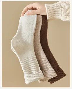 Thickened winter wool knit socks for women, cozy thermal long crew socks in three neutral colors.