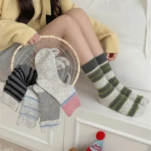 Thick speckle yarn slouch socks detail, retro wool-blend crew socks with stripes in cozy daily scene.