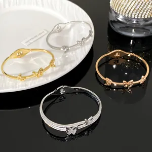Elegant butterfly titanium steel bangles with crystal details in assorted colors